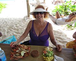 Phyllis eating crayfish